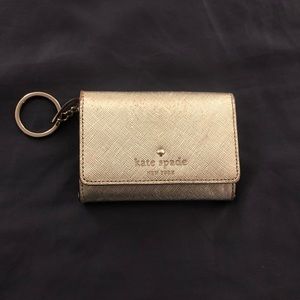 Gold Kate Spade Wristlet